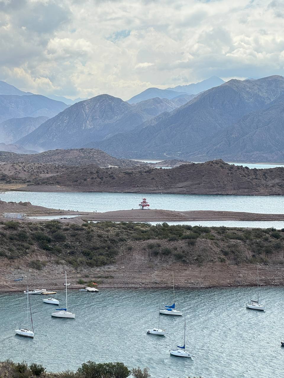 Potrerillos reservoir surrounded by the Andes